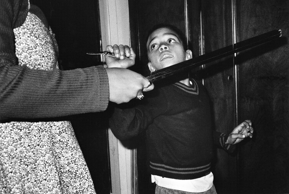 Jodi Bieber, A neighbours iron bar versus Bradley’s pen knife, 1996 fine art photographic print available from Gallery F