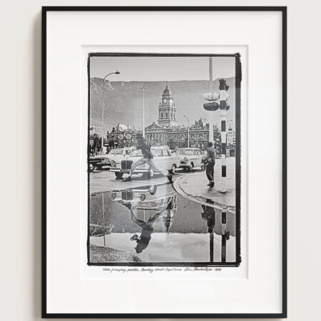 Obie Oberholzer | Man Jumping Puddle, Darling Street, Cape Town, 1968